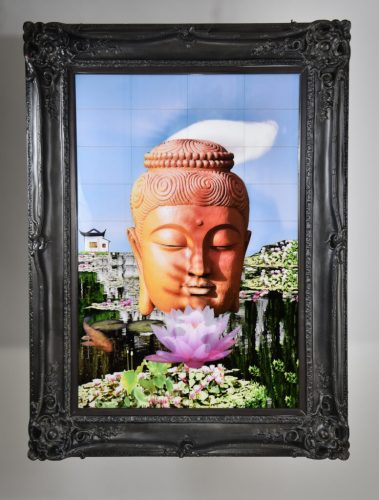 wall hung photo collage of Buddha